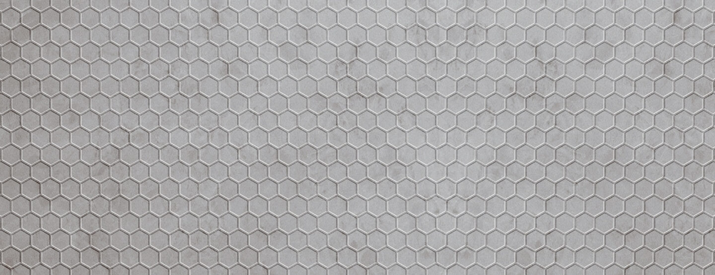 Whole plate photo of light gray textured design plate in velvet look