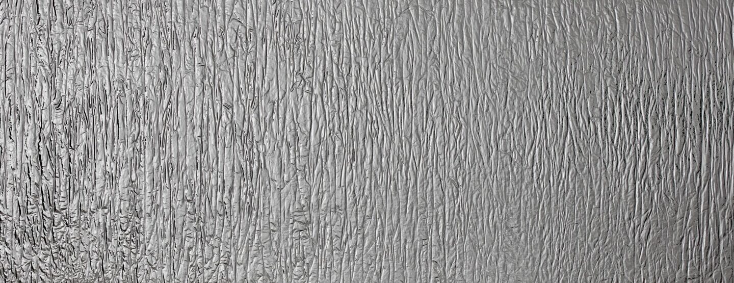 Full plate photo of silver mirror design plate with deep crumpled texture