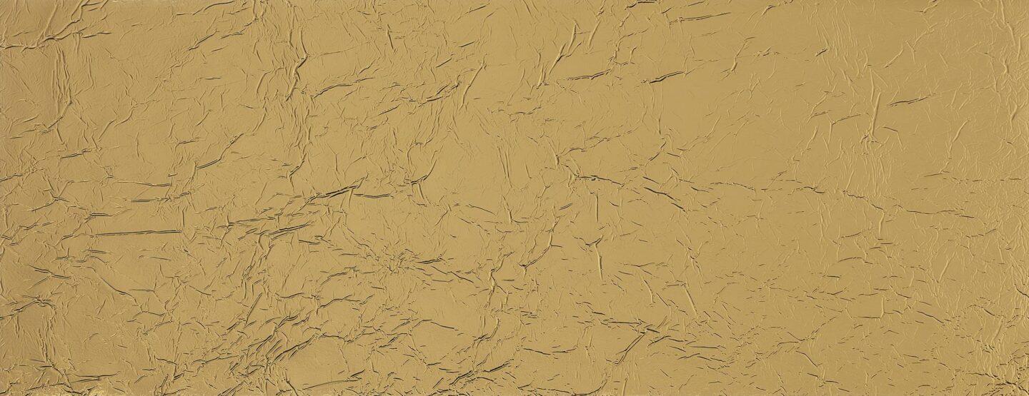 Ganzplattenfoto einer Gold reflektierenden und strukturierten Designplatte