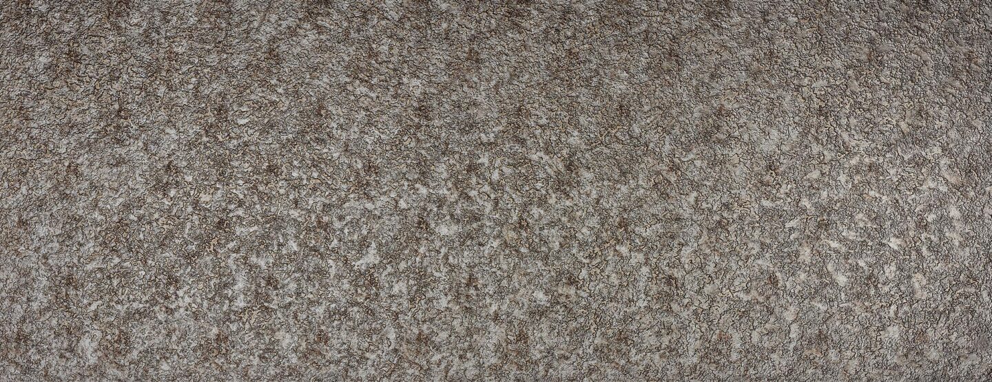 Ganzplattenfoto einer strukturierten Designplatte im Vintagelook und Lavamaserung