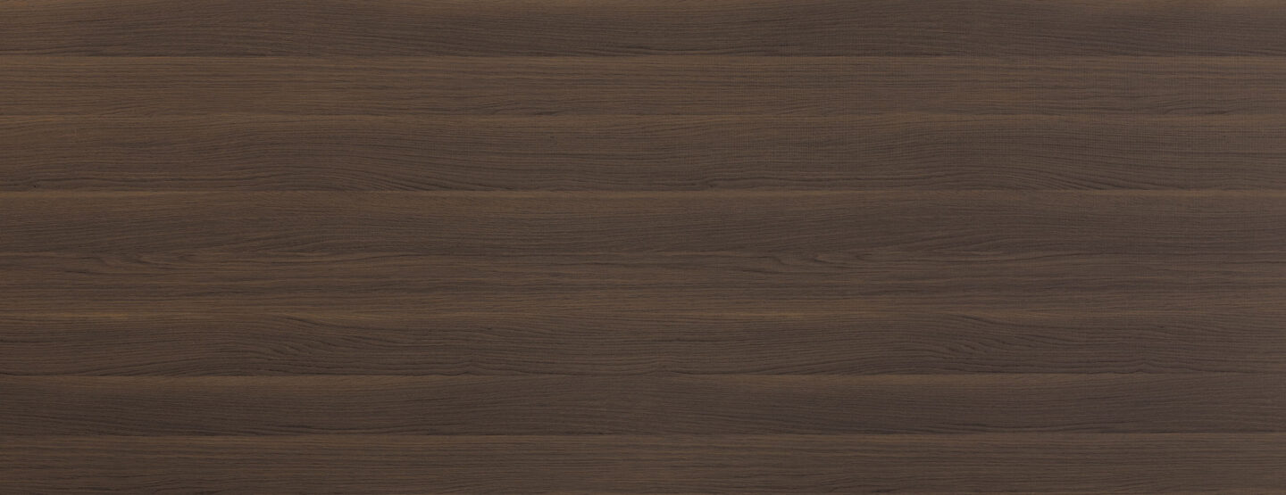 Whole panel photo of a decorative panel with fine wood grain in dark brown tones