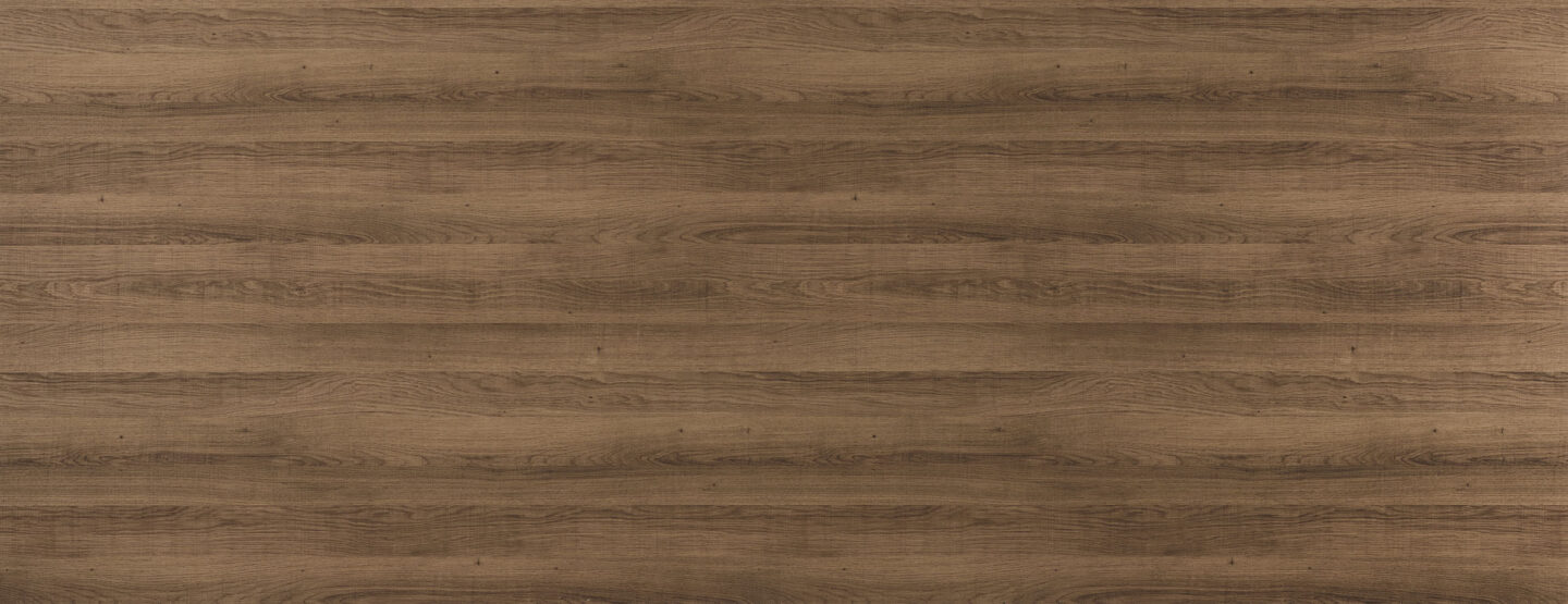 Whole panel photo of a decorative panel with fine wood grain in warm brown tones