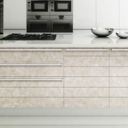 Modern bright kitchen with beige marbled fronts