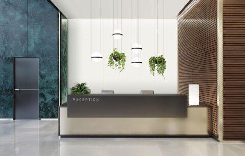 moderne Rezeption in Gold, im Hintergrund weiß gesteppte Wandverkleidung im Lederlook