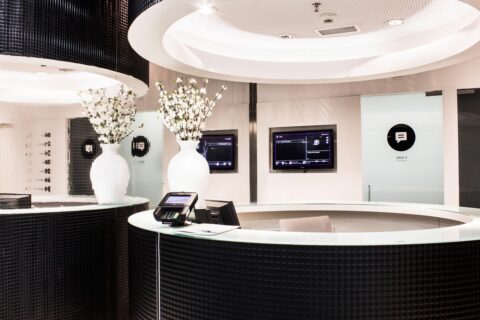 Reception area with dark, high-gloss elements