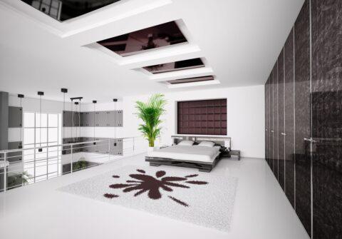 Modern bedroom in black and white, dark high gloss cabinet fronts