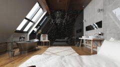 Loft mit hochglänzender Wandverkleidung in schwarzem Marmor, davor freistehende Badewanne