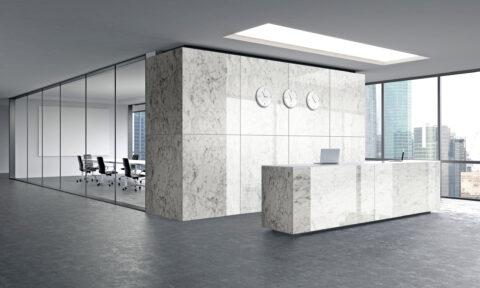 Bright reception area of an office with high gloss marble fronts