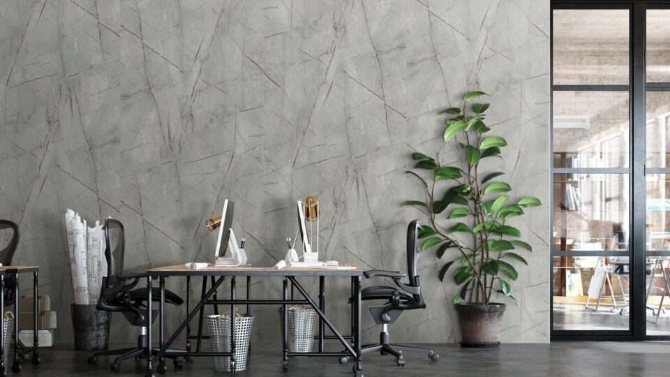 modern open office with stone look wall panels and golden veins