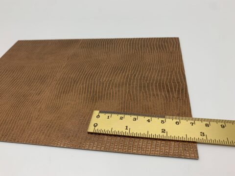 Detailaufnahme mit Lineal des Dekors LL LEGUAN Copper