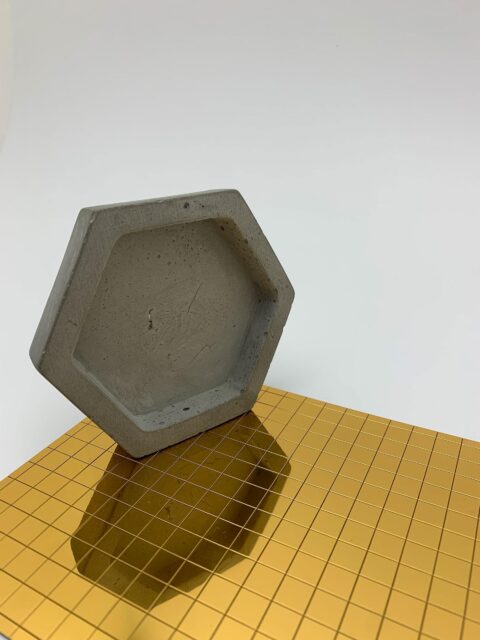 mirror mosaic decor in gold with concrete honeycomb