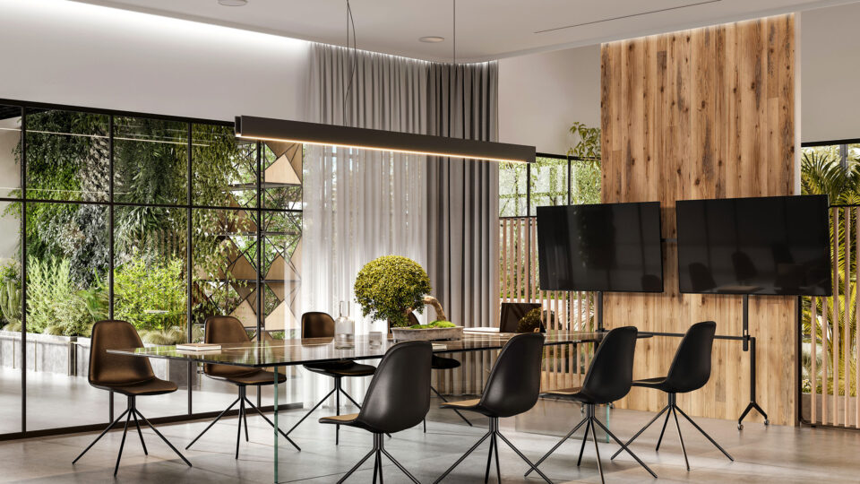 Modern meeting room in industrial lookl combined with wooden panels behind TV