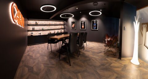 Dining area with matt black walls