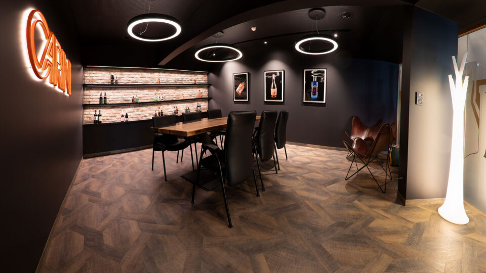 Dining area with matt black walls