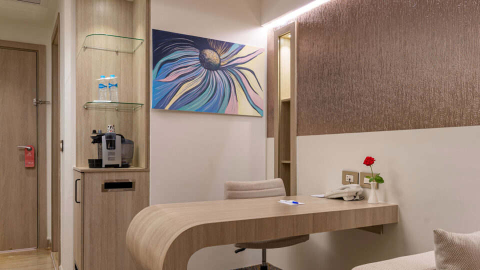 Desk area in a bright hotel room