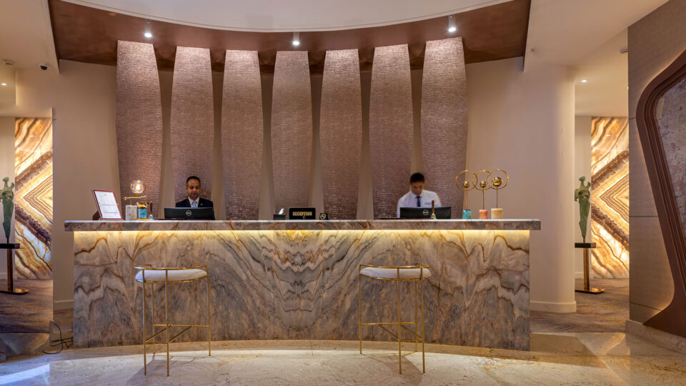 Hotel reception with a marble counter