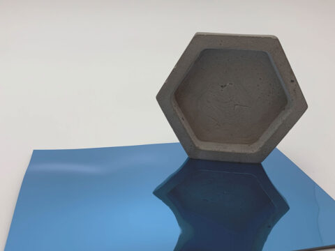 Honeycomb with blue reflective decor with texture