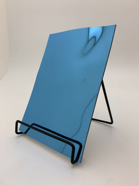 Display stand with blue reflective decor with structure