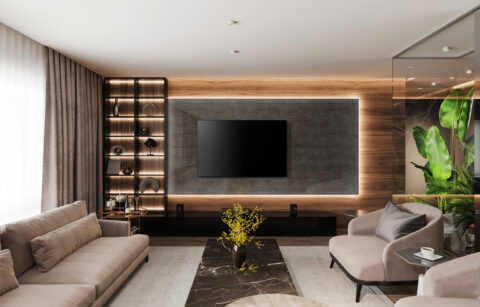 Living room with large TV, bright and modern furnishings
