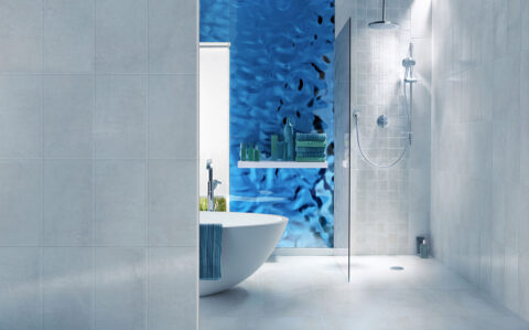 Bathroom with iceblue wall in wavy mirror look