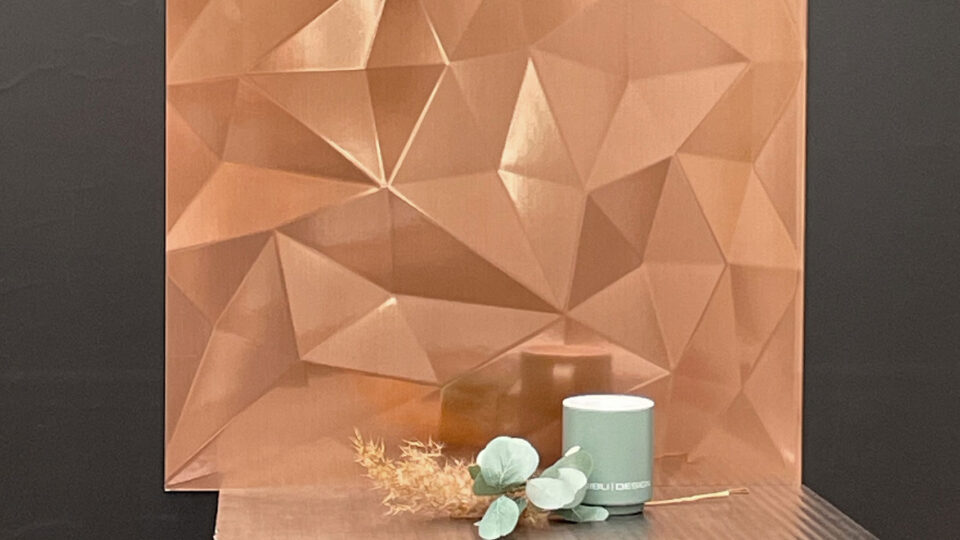 Shown is an excerpt of a design panel with a diamond-like structure. The color is brushed copper, creating an incredible depth in the textured design panel.
