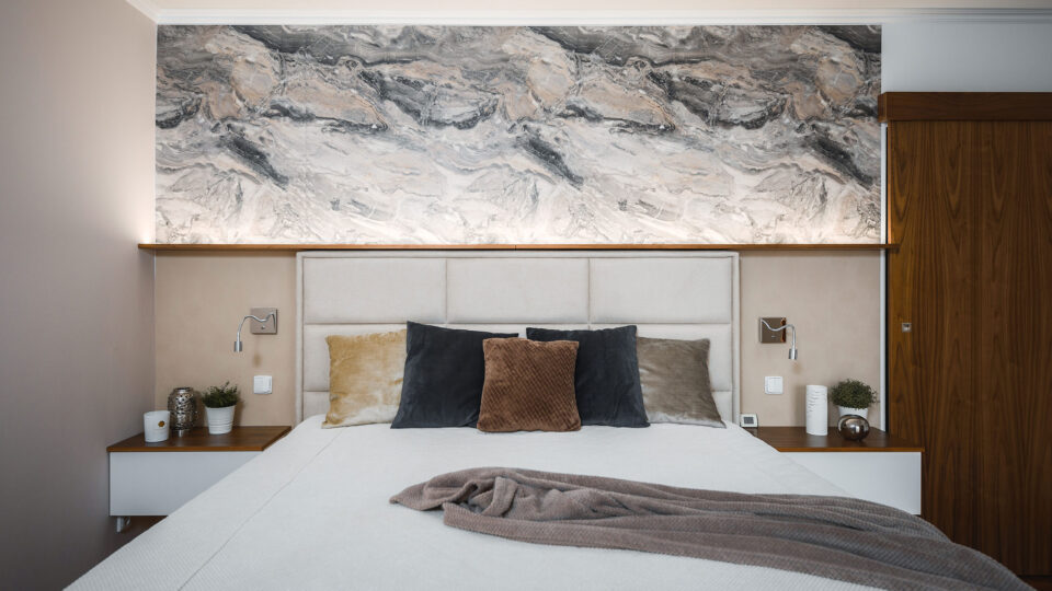 Bright bedroom with marbled wall