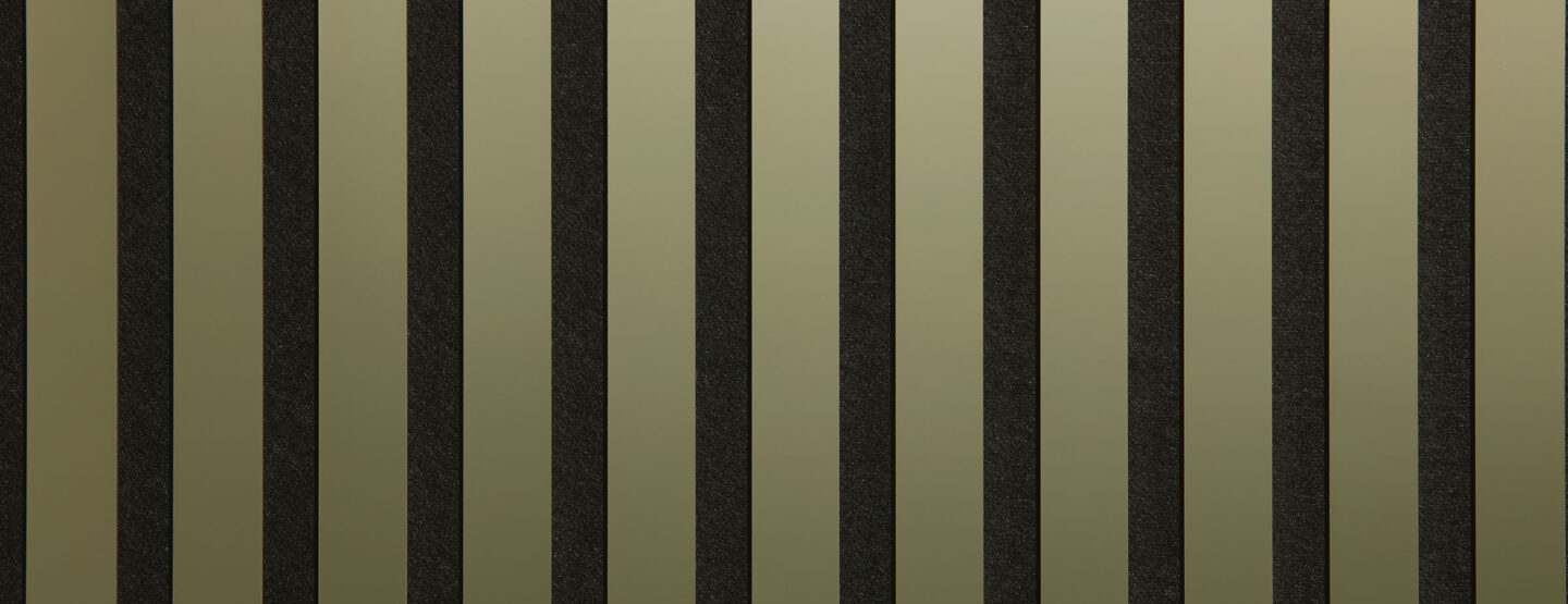 Detailed shot of a sound-absorbing acoustic panel. The surface is black and features elegant, reflective gold stripes.