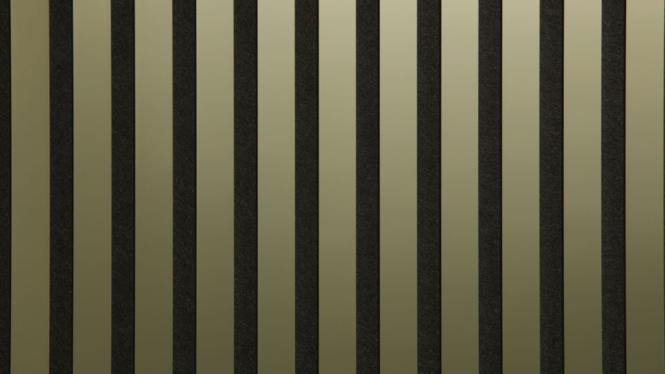 Detailed shot of a sound-absorbing acoustic panel. The surface is black and features elegant, reflective gold stripes.