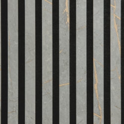 Detailaufnahme eines schallabsorbierenden Akustikpaneels. Die Oberfläche ist schwarz und wird von edlen, gräulich, mit goldenen Adern durchzogenen, Streifen durchzogen.