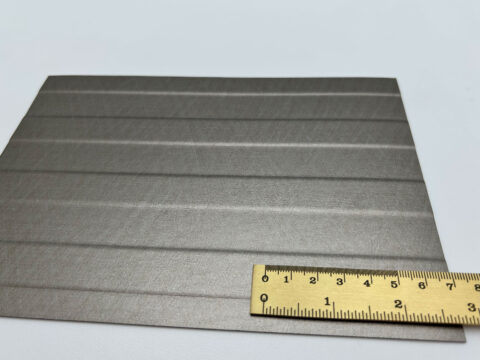 Detailed shot with ruler of the design panel LL LANE METALLIC USED Titan.