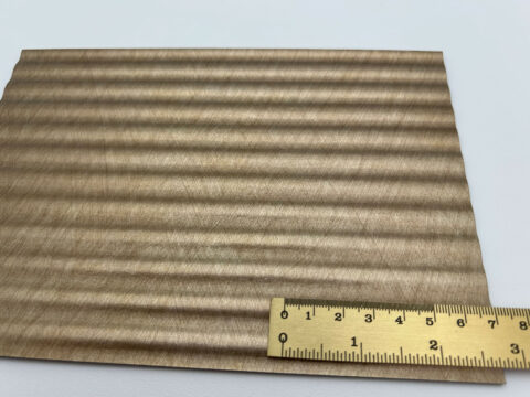 Detailed shot with ruler of the design panel LL WAVE 12 METALLIC USED Sand