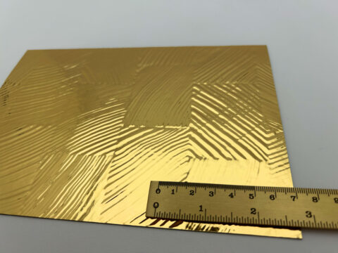Detailed shot with ruler of the SL GRAIN Gold design panel.