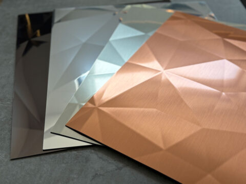 Shown are four color variants of the SL DIAMOND decorative panel, in both brushed and reflective finishes. Its distinctive feature is the structure reminiscent of a diamond cut.