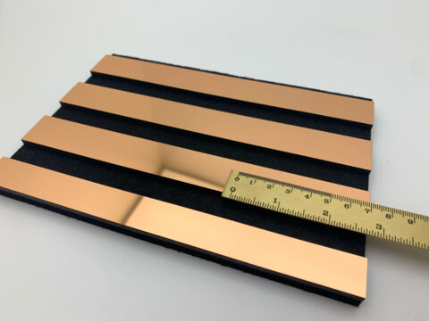 Detailaufnahme mit Lineal des ACOUSTIC WALL PANELS AP in der Farbe Rosegold